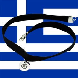 Kpop merch black choker with silver and star pendant on blue and white background.