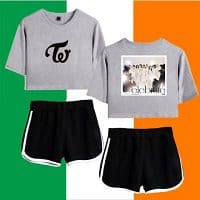 Kpop merch clothing set featuring a gray cropped sweatshirt and black shorts, perfect for K-pop fans and performers.