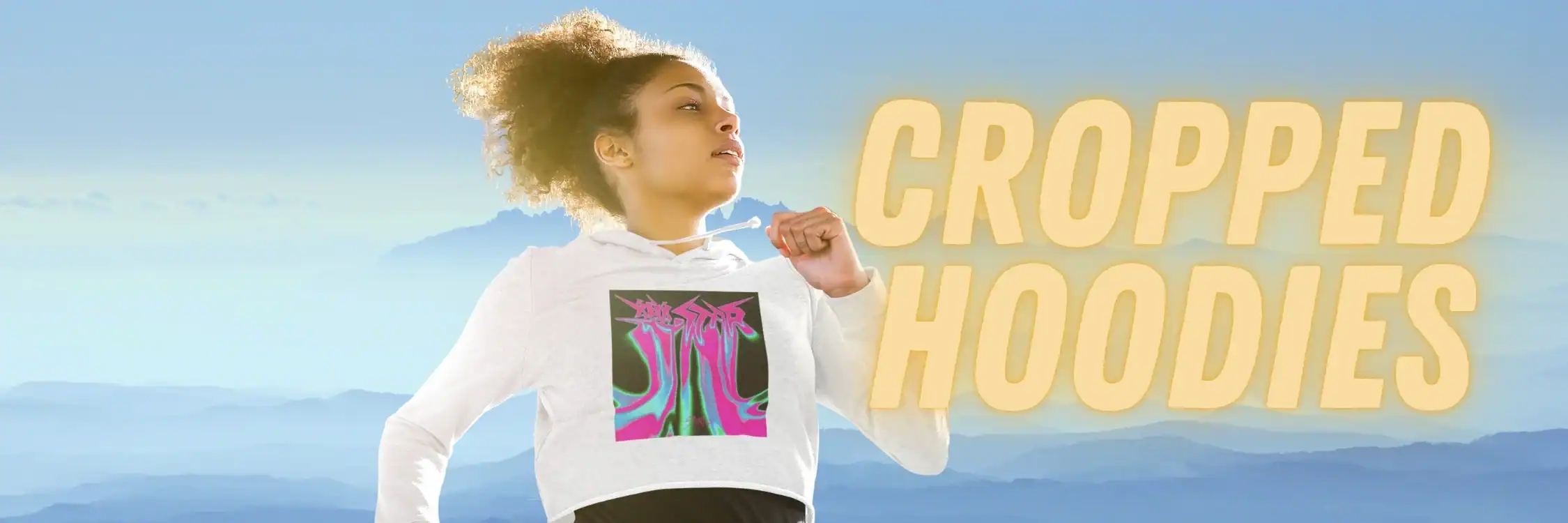 Bold, pastel-colored hoodie featuring a vibrant, psychedelic graphic design perfect for K-pop fans and fashion enthusiasts.