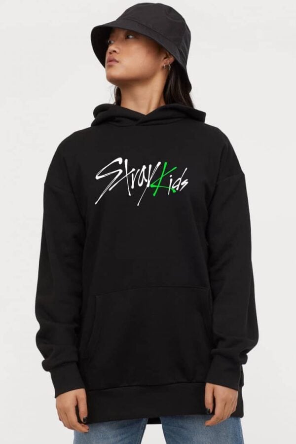 Black hoodie with "Stray Kids" logo, casual streetwear, K-pop merchandise, oversized fit, unisex design, popular among fans.