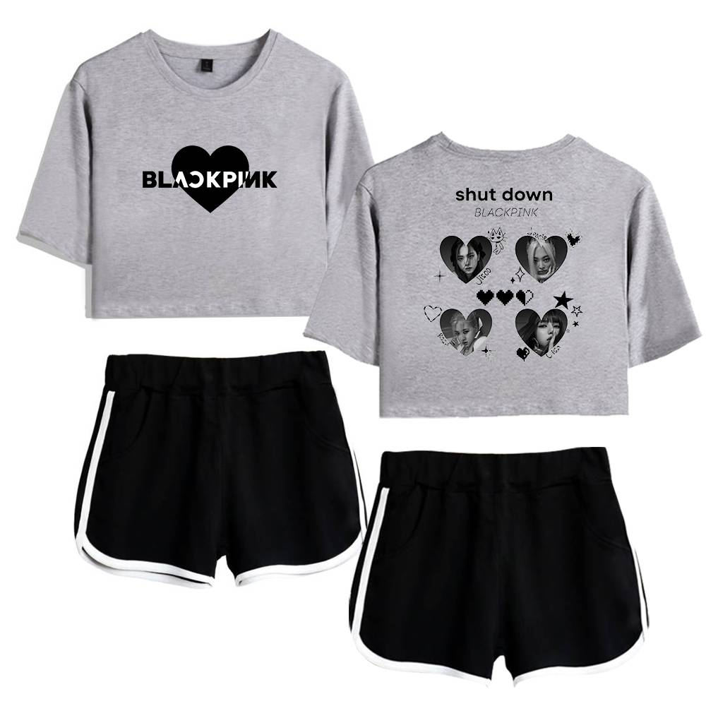 Bold blackpink cropped sweatshirt with heart graphic and text.