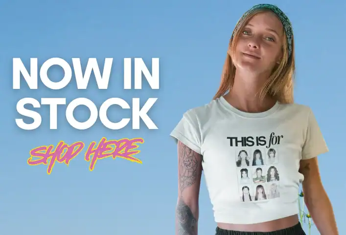 Casual woman wearing a K-pop themed T-shirt with group photos printed on it, promoting Kpop merch.