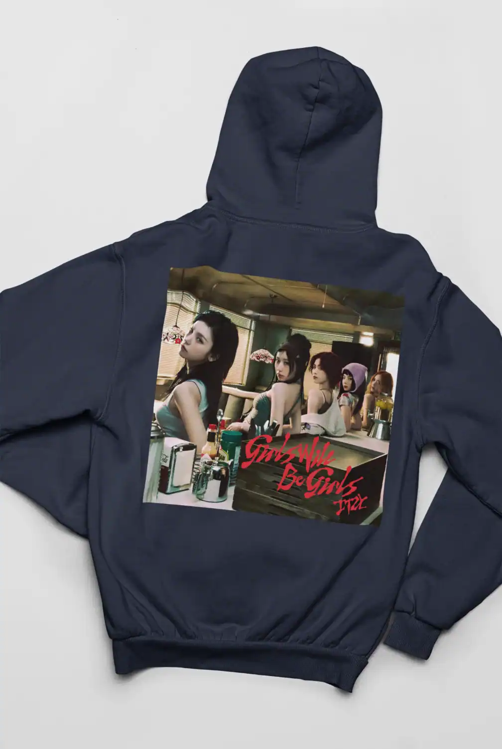Girls' Generation K-pop merch hoodie with group photo and red logo print.