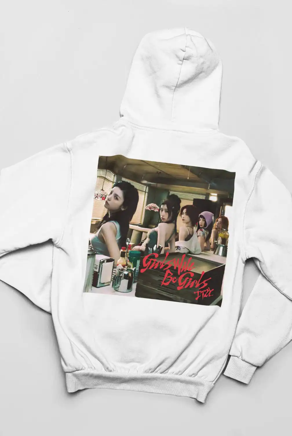 Girlz Will Be Girls white hoodie with a printed image of a girl group and red text.