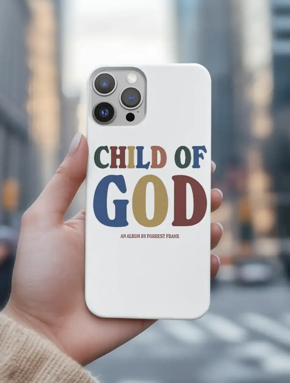 Colorful "Child of God" phone case with text design and album information.