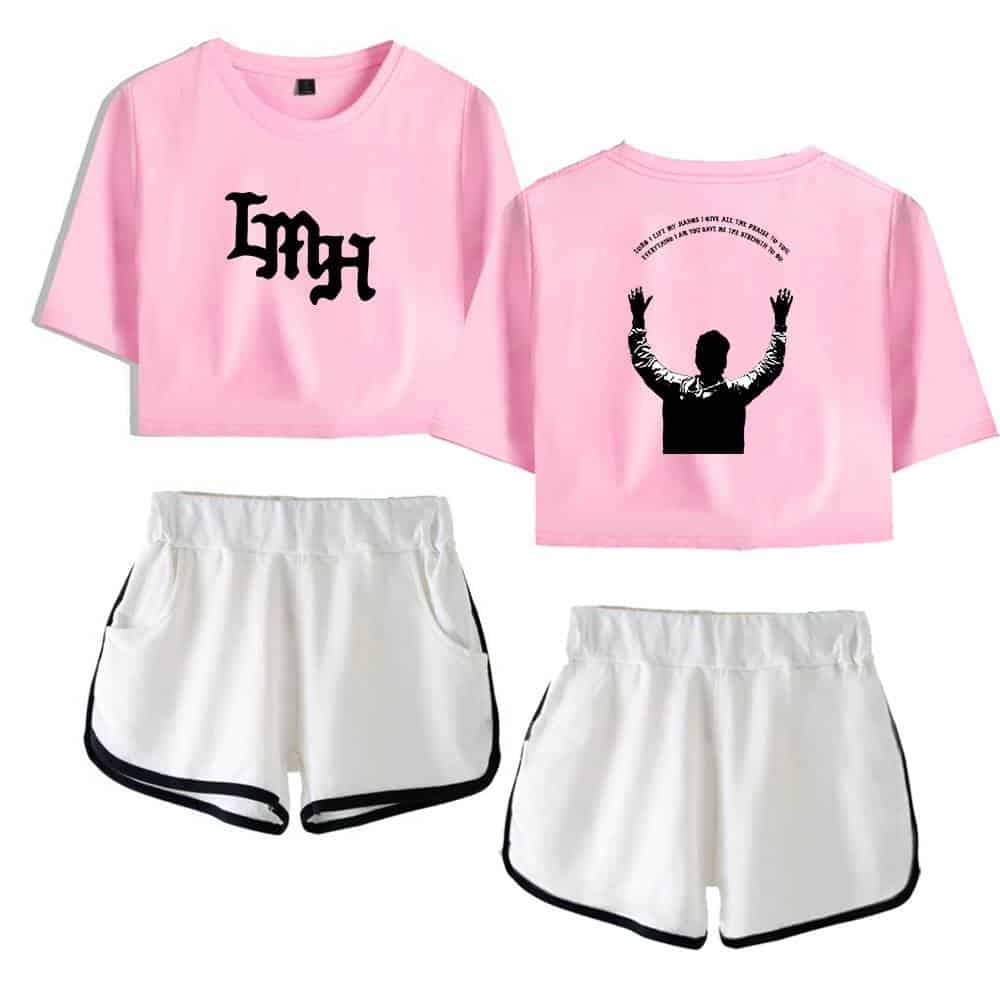 Pink crop top with black graphic print and white shorts with black trim, ideal for Kpop fan merchandise.