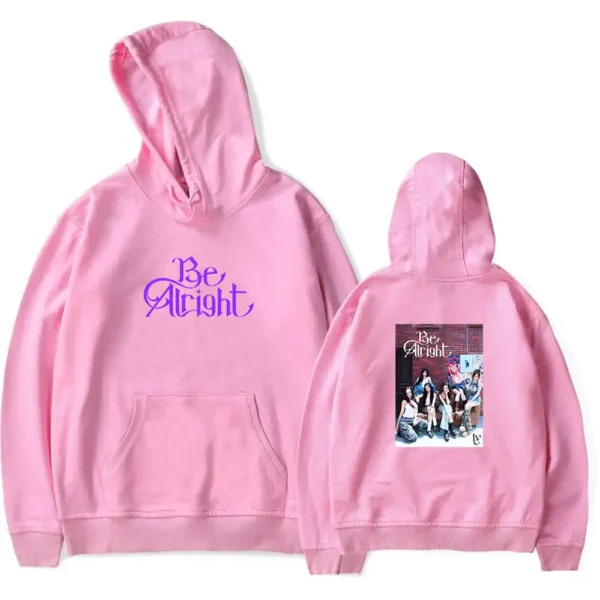 Be right pink hoodie with group photo print and "Be Right" text in purple, trendy K-pop merchandise hoodie, stylish fan apparel for K-pop fans, comfortable casual wear for K-pop enthusiasts.