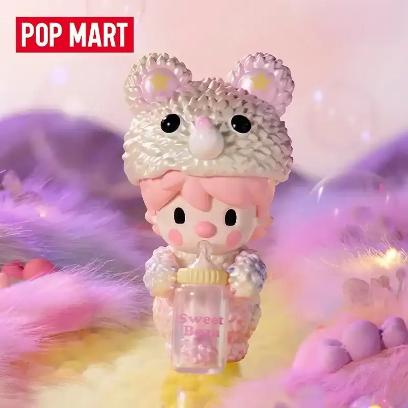 Cute kawaii character with pastel pink hair holding a bottle labeled "Sweet Bean" in front of fluffy pink and purple decorations.