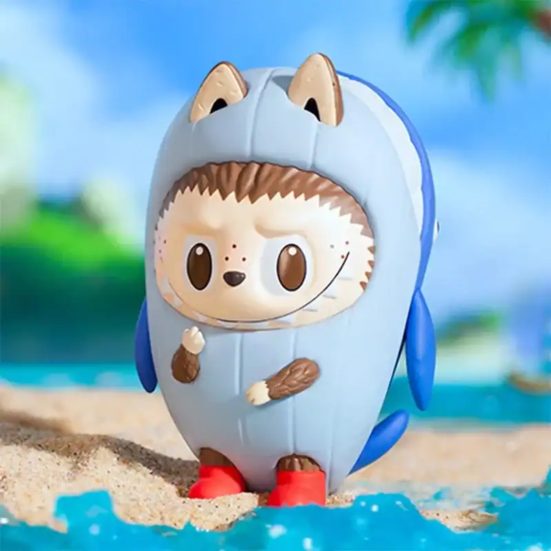 Cute animal-themed plush toy with a lion face dressed in a dinosaur costume, standing outdoors on sandy ground with a blurred natural background.