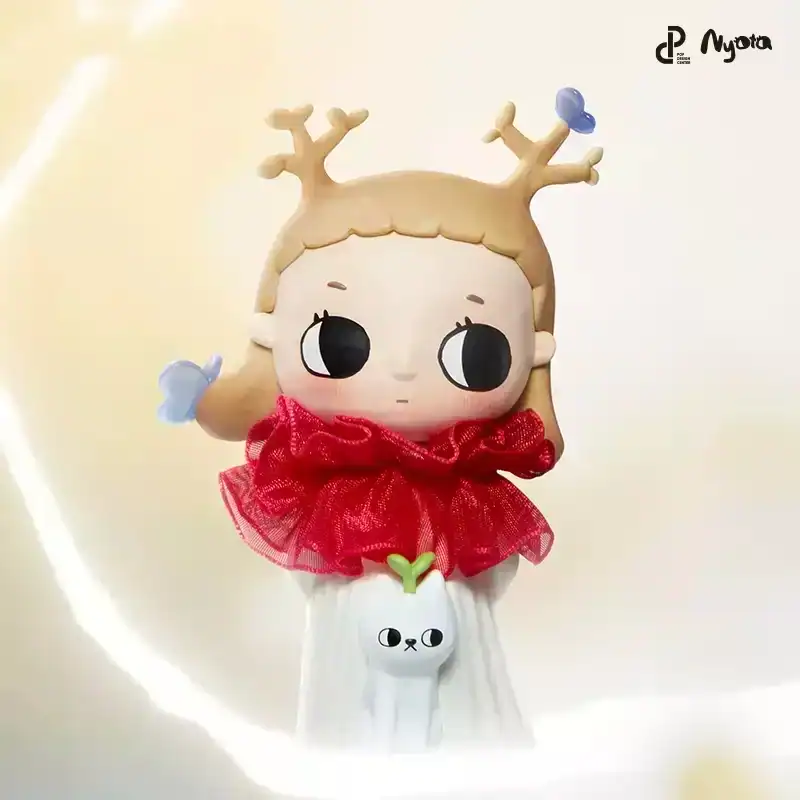Kyungsoo doll in red dress with antlers, cute K-pop merchandise plush toy.