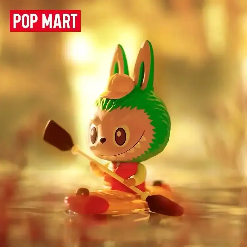 Pop mart kpop merch toy figure with bunny ears and paddle in a kayak.