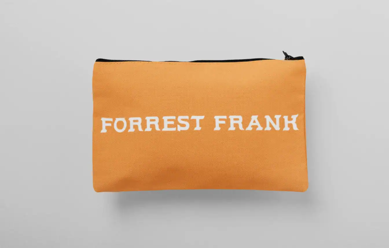 Forrest frank kpop merch bag with orange color and white text.