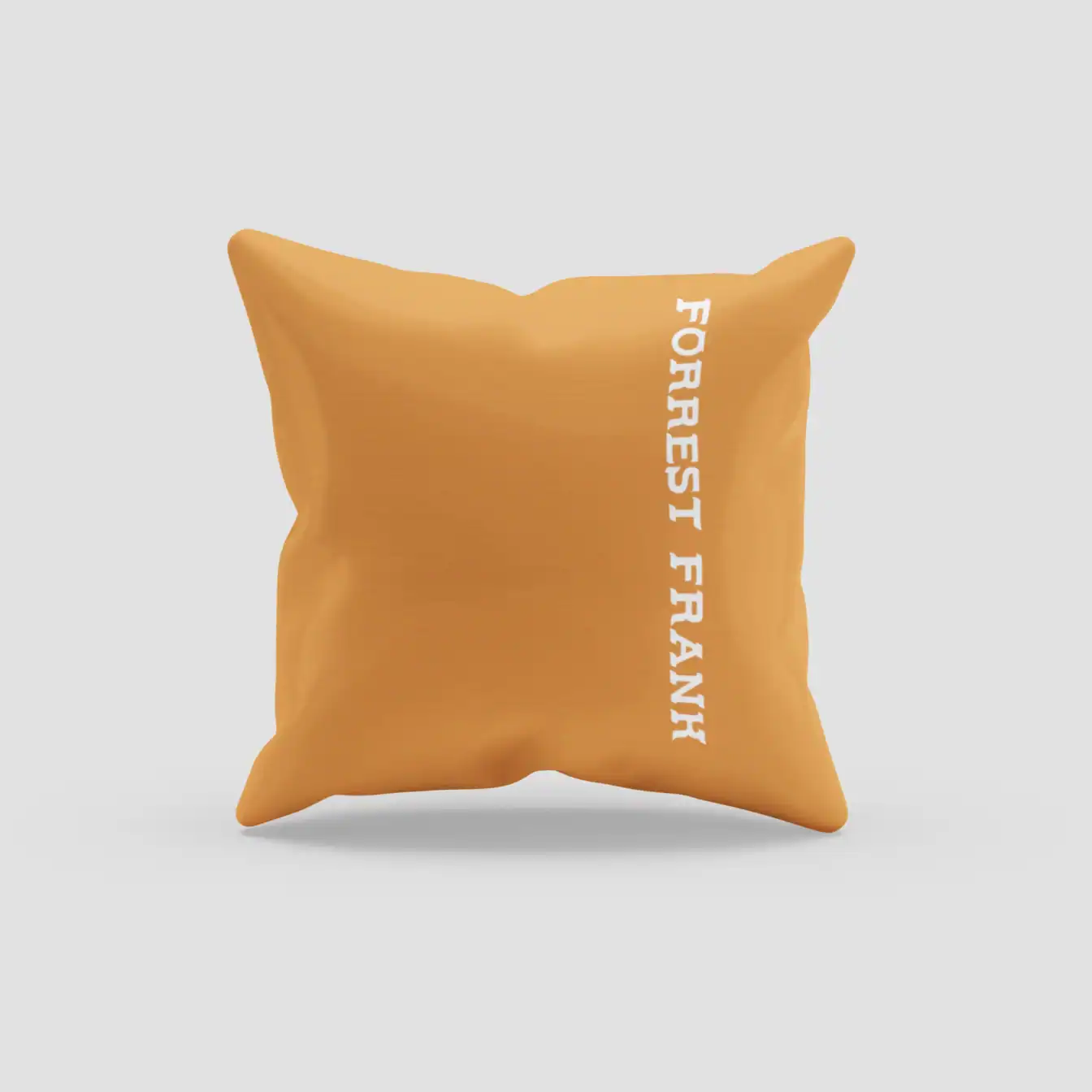 Furry orange pillow with white "FURREST FRANCA" text, part of K-pop merch collection.