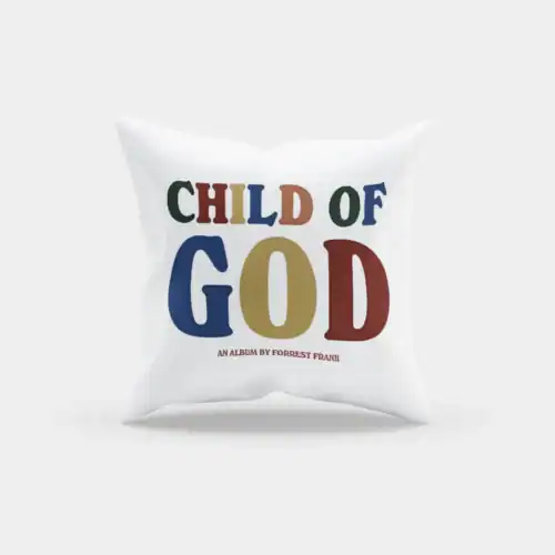 Child of God pillow with colorful text design.