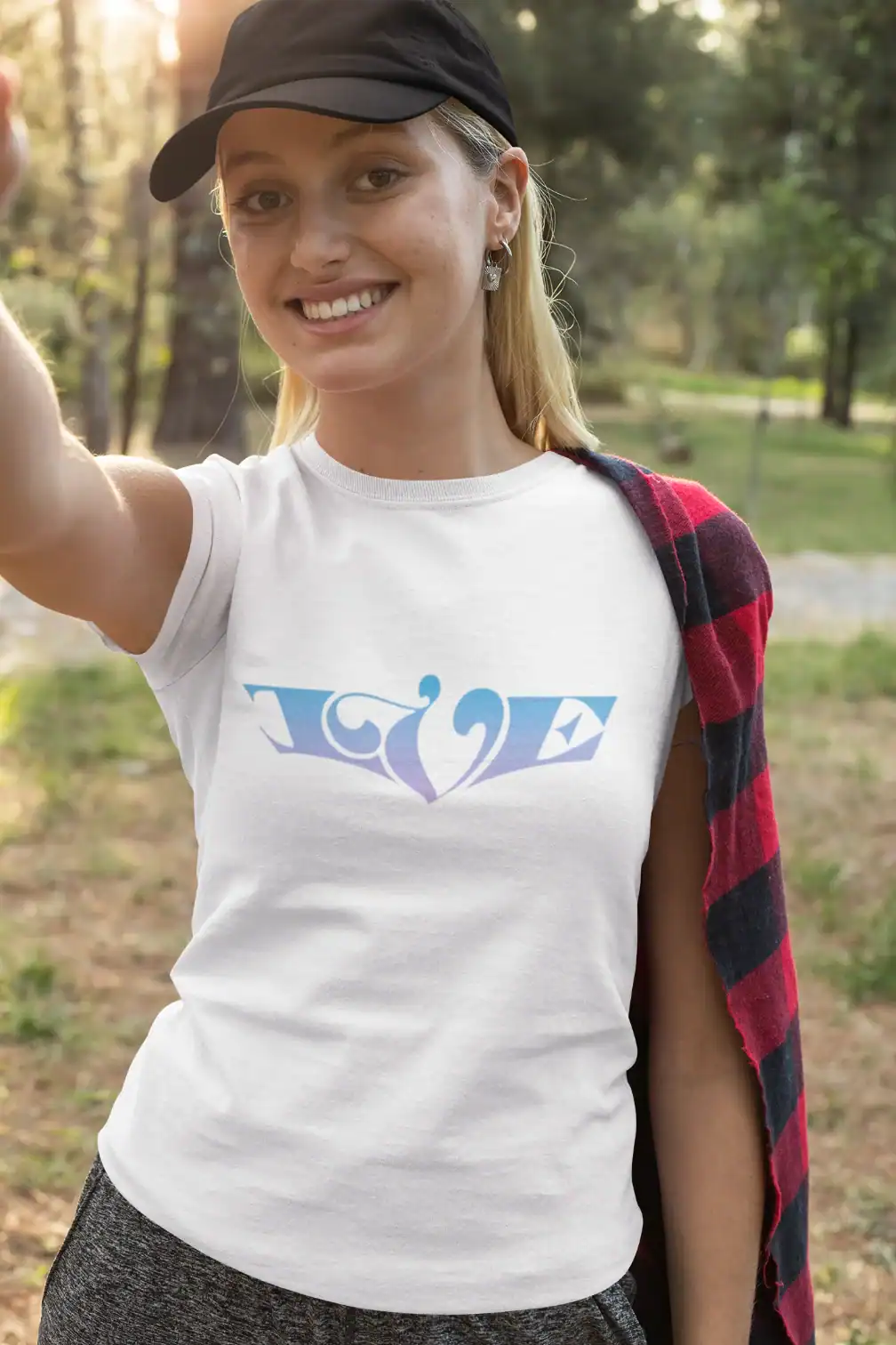 LOVE logo graphic on a white t-shirt, casual streetwear style.