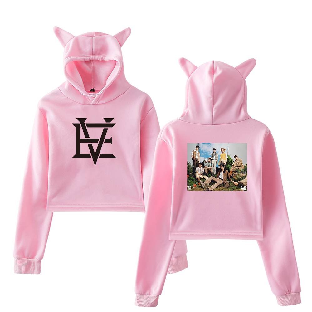 Pink kpop hoodie with cat ears and a group photo on the back, perfect for fans.